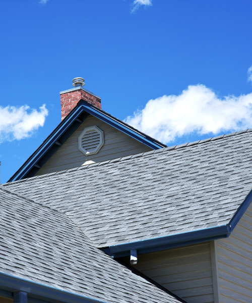 A view of a roof with a clock on it